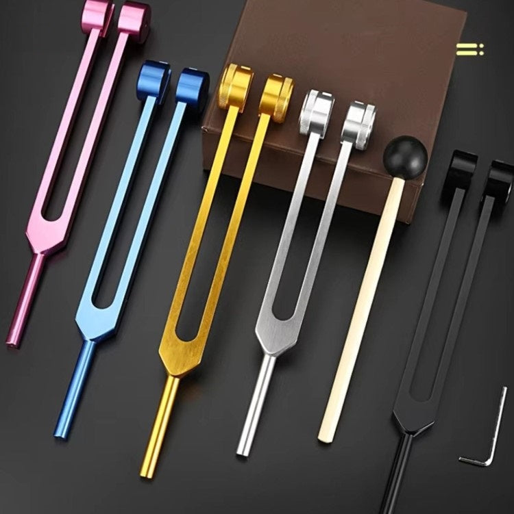 Unisex sound therapy kit: golden tuning forks for inner calm & healing.