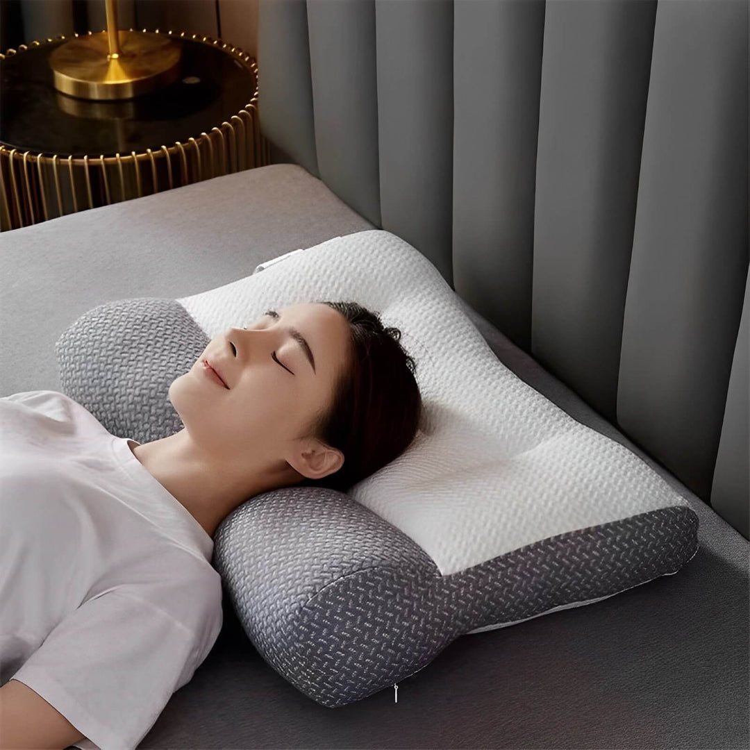 Gray ergonomic memory foam neck support pillow for restful sleep & pain relief. Orthopedic cushion for comfort.