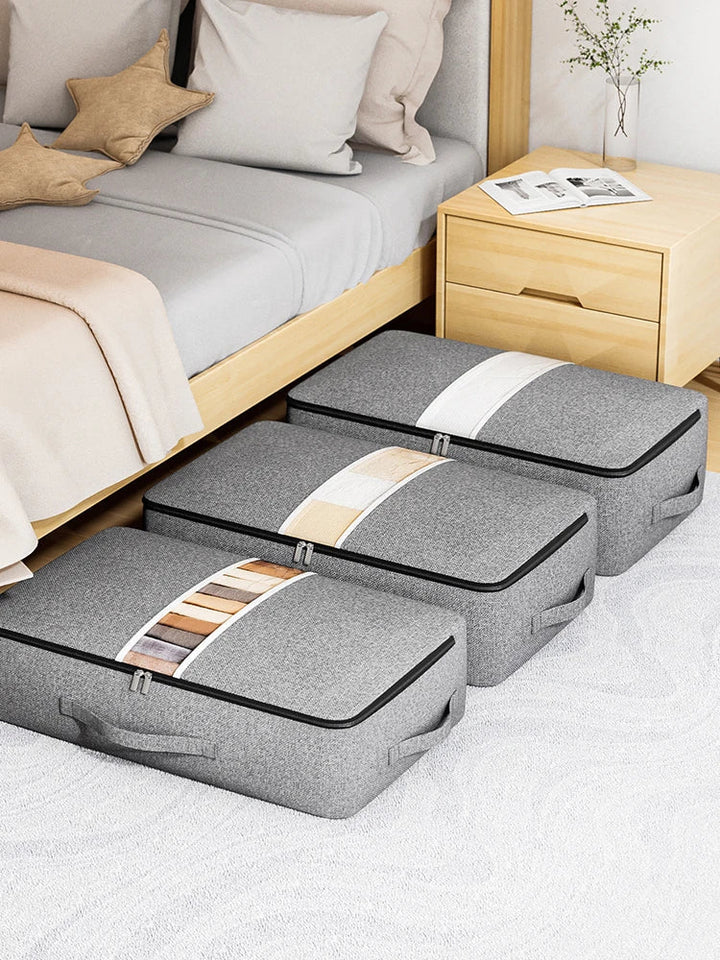 Gray underbed storage bag for home organization. Space-saving solution for bedding & clothing in closets.