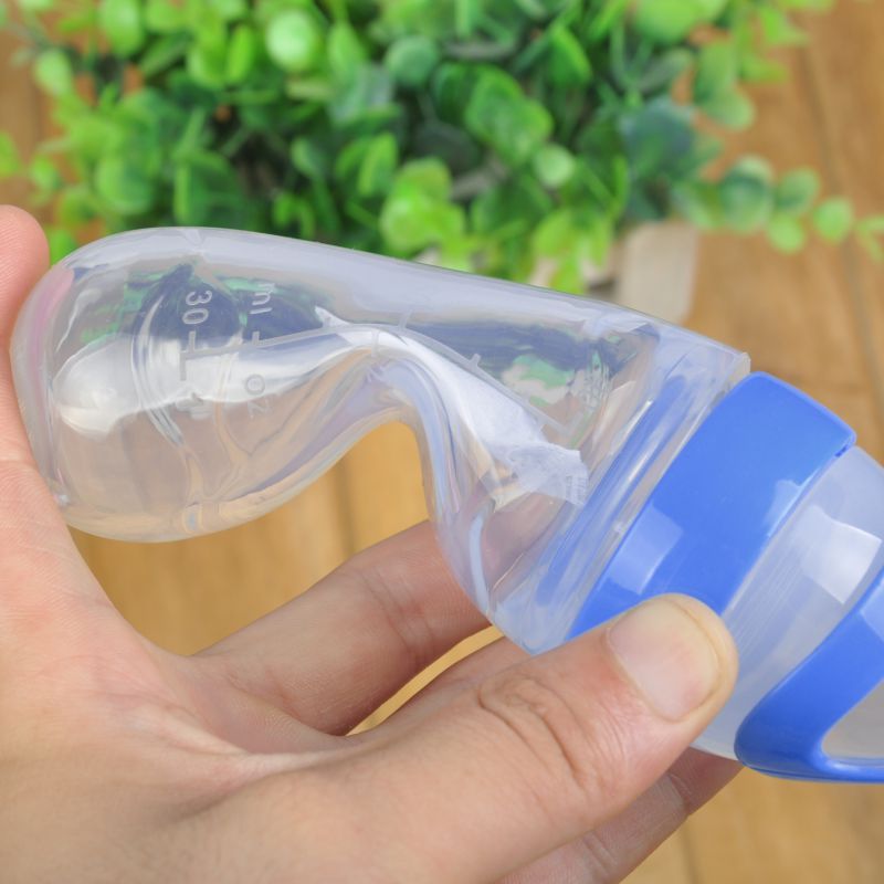 FeedEase baby feeding spoon bottle, blue, a convenient puree dispenser for infants.