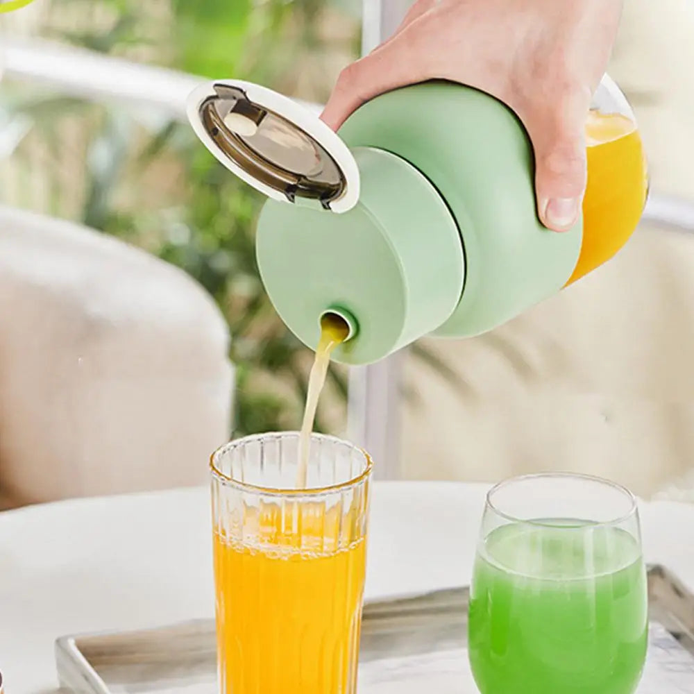 Green portable blender & juicer for fresh smoothies on-the-go. USB rechargeable, BPA-free personal blender.