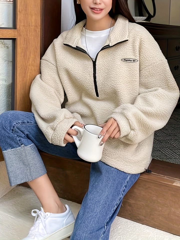 Casual green women's quarter-zip pullover sweatshirt, ideal for layering or relaxed daily wear.