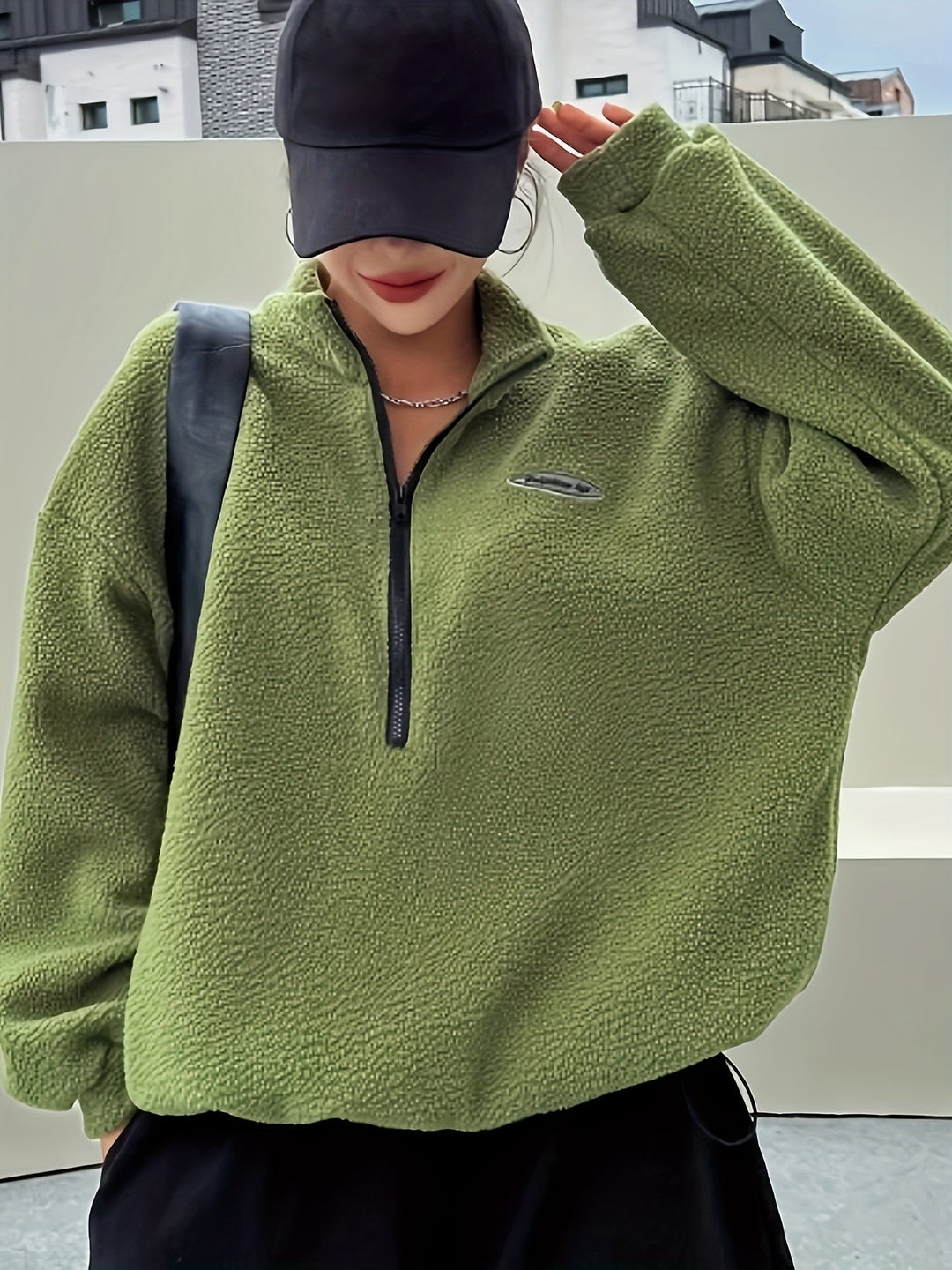 Warm beige women's pullover sweatshirt with a zipper, a comfortable and versatile piece for any wardrobe.