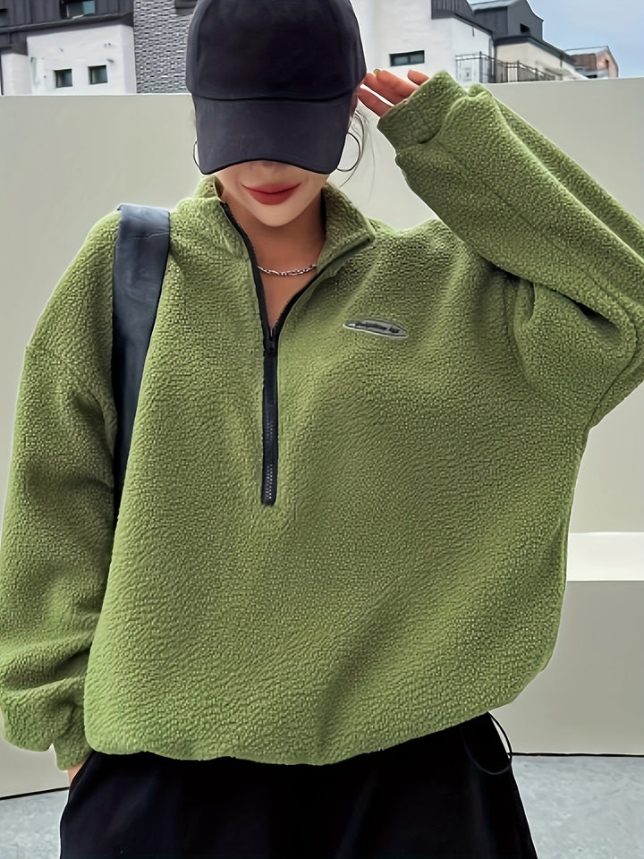 Warm beige women's pullover sweatshirt with a zipper, a comfortable and versatile piece for any wardrobe.