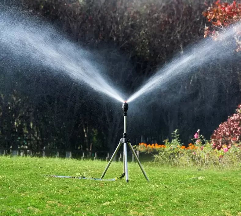 Adjustable 360° automatic garden sprinkler for effortless lawn and plant irrigation & yard maintenance.