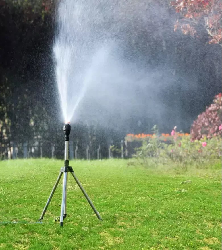 Efficient 360° watering system for comprehensive lawn care, plant irrigation, & outdoor landscaping.