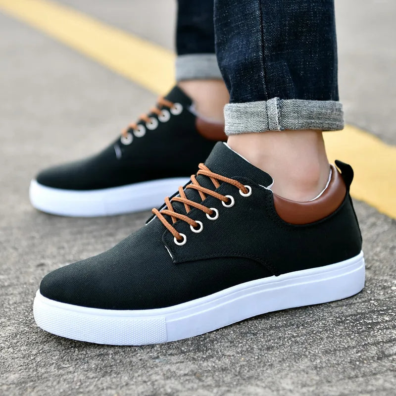 Black Men's Monarch low-top sneakers. Comfortable, versatile casual footwear for everyday wear & street style.