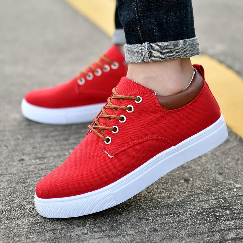 Modern Men's Monarch black low-top sneakers. Lace-up design, perfect for casual everyday comfort and street style.