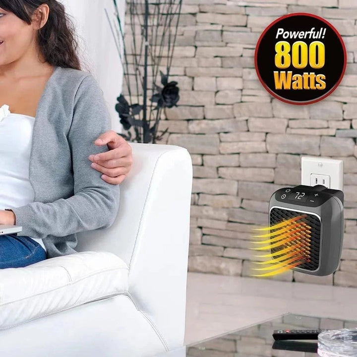 Efficient grey electric room heater with remote control, designed for compact spaces and personal comfort.