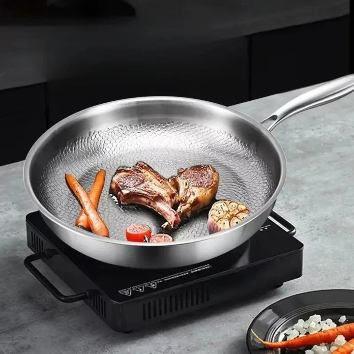 Premium hammered titanium non-stick skillet, perfect for gourmet cooking on induction hobs.