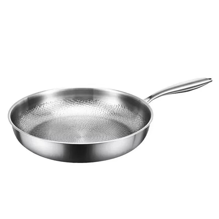 High-performance non-stick frying pan with a striking hammered titanium finish, induction-ready.