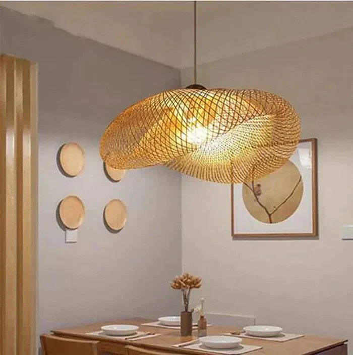 Hand-woven rattan pendant light for natural & boho home decor. Sustainable ceiling fixture for ambient lighting.