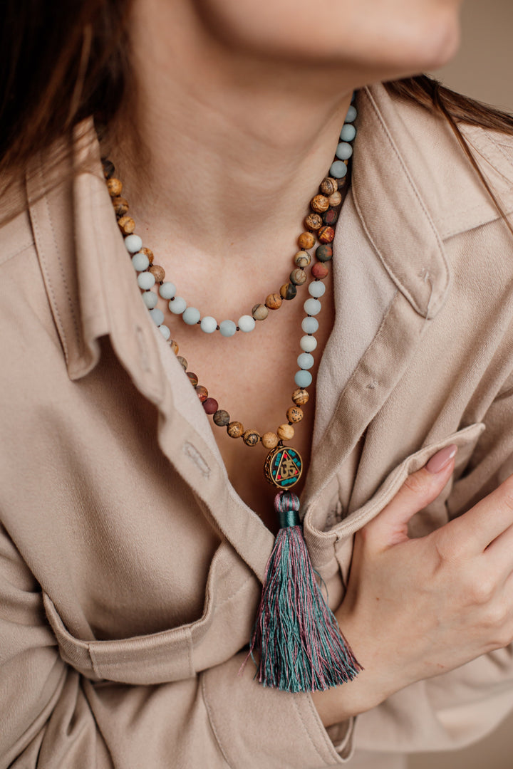 Unisex Aum Mala necklace featuring Amazonite & Jasper beads. Handcrafted spiritual jewelry for meditation & yoga.