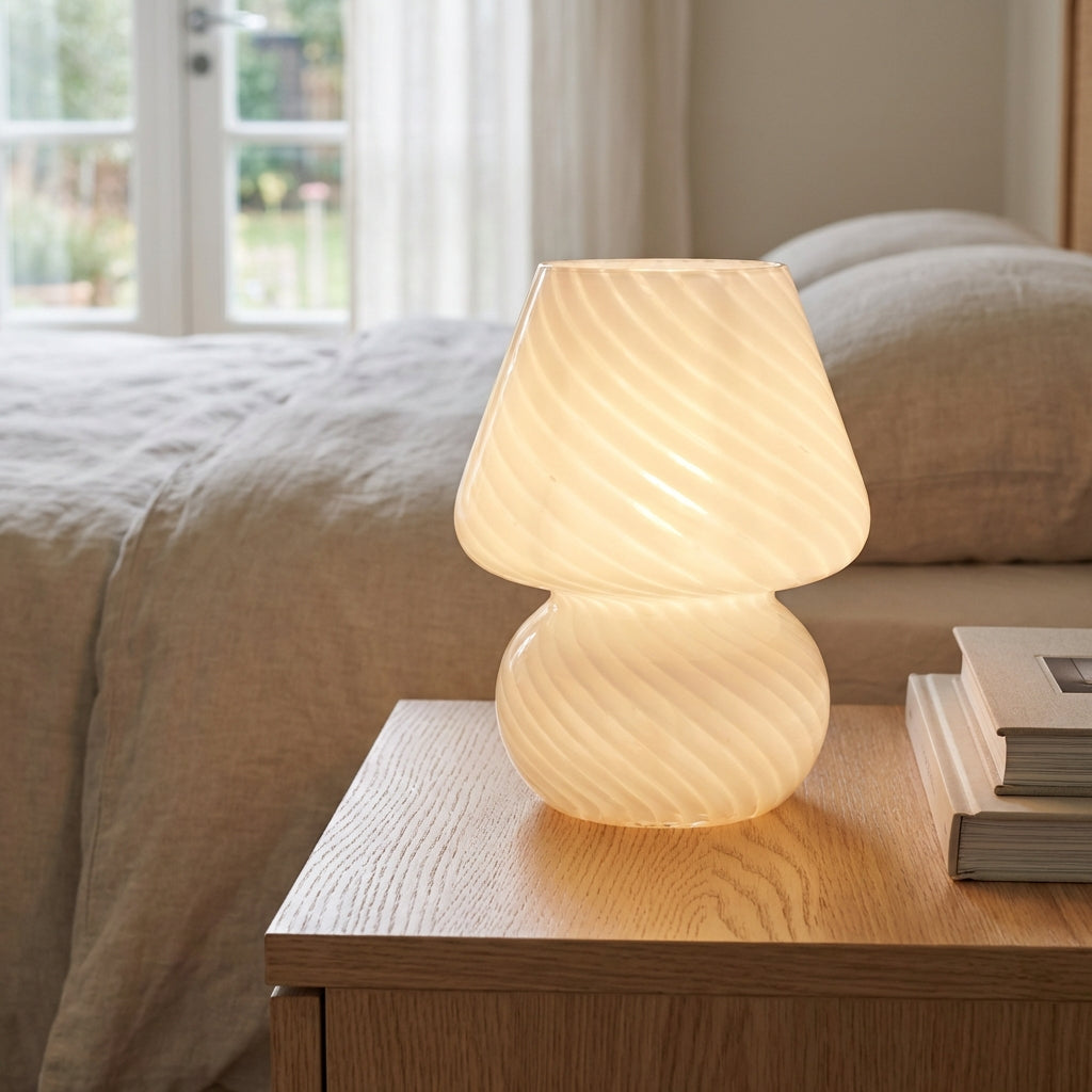 Handcrafted artisan accent table lamp with Murano glass, providing warm ambient light for home decor