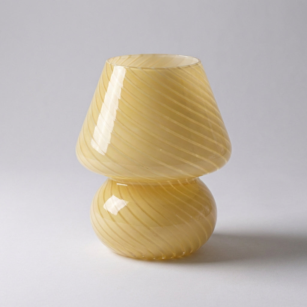 Living room decor with a handcrafted artisan table lamp, providing gentle illumination and a designer touch