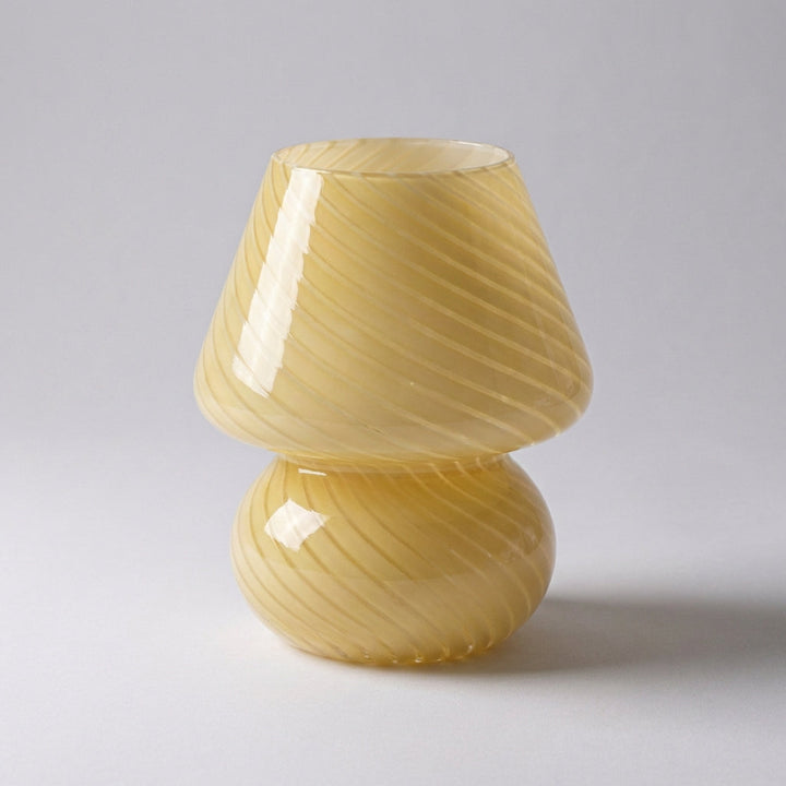 Living room decor with a handcrafted artisan table lamp, providing gentle illumination and a designer touch