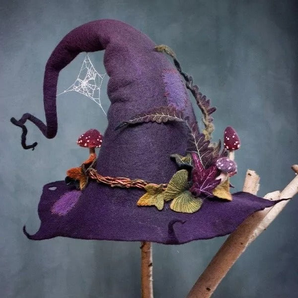 Handcrafted black felt witch hat for women's Halloween costume party. Merino wool, adjustable fit.