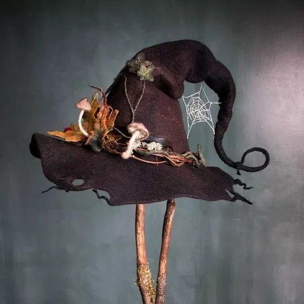 Elegant women's handcrafted witch hat, perfect for Halloween parties & costumes. Black merino wool felt.