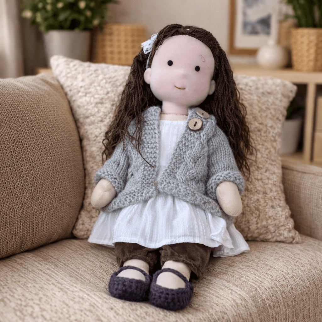 Warm and inviting cotton Waldorf doll, a perfect imaginative playmate for children.