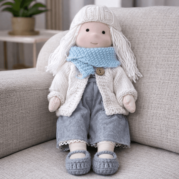 Soft cotton Waldorf cuddle doll, ideal for children's imaginative play & cozy snuggles.