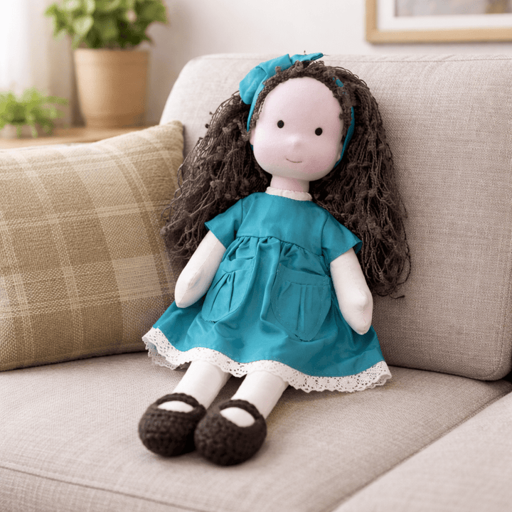 Handmade soft toy: cotton Waldorf doll, promoting creative and quiet play moments.