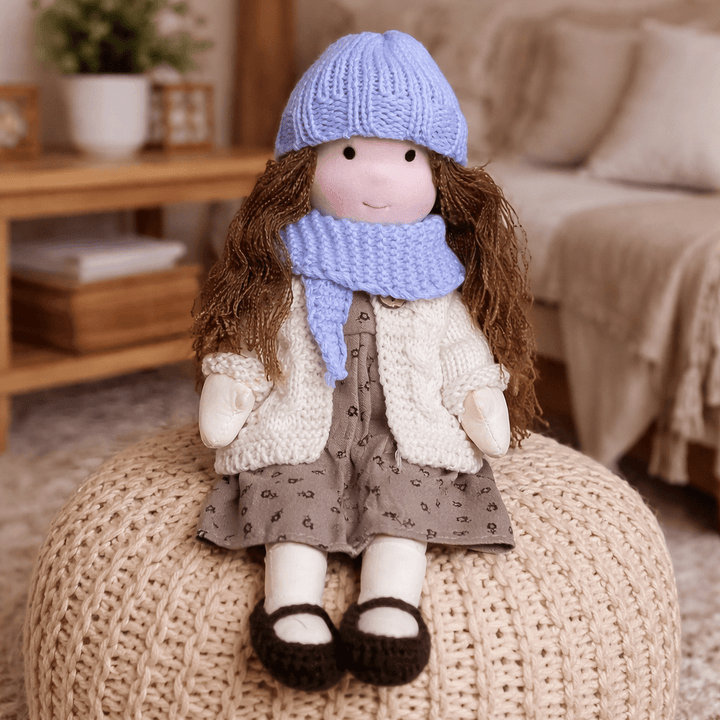 Artisanal Waldorf doll, handmade from cotton, inspiring creative play for kids.