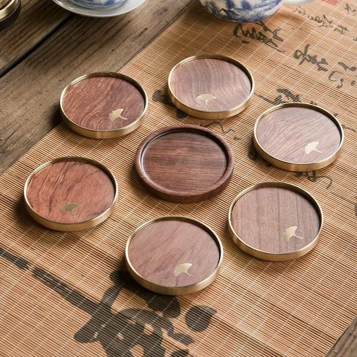 Handcrafted ginkgo wood coasters, an ideal gift for housewarmings or home decor enthusiasts.