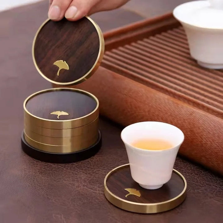 Durable ebony ginkgo leaf drink coasters, adding sophisticated elegance to your table.