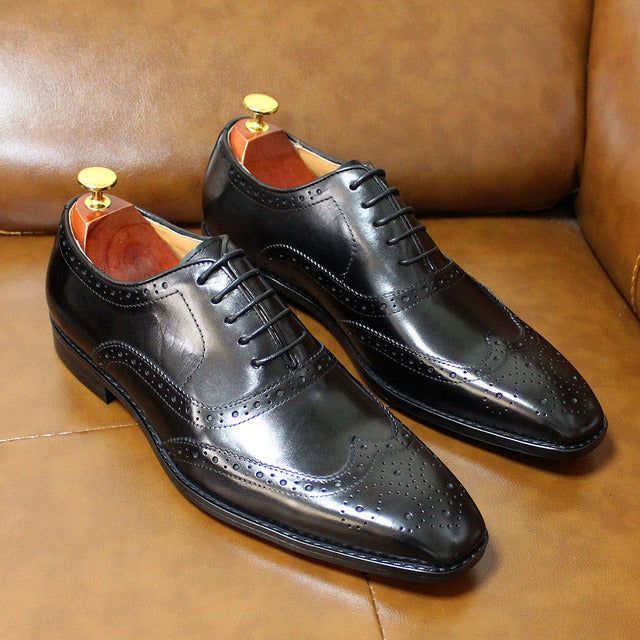 Elegant men's handcrafted leather oxford brogues. Perfect wingtip dress shoes for formal occasions & business fashion.