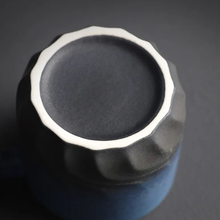 Smooth ceramic Mini Retrograde mug, handcrafted with a warm wooden handle. Perfect for any retro coffee setup.