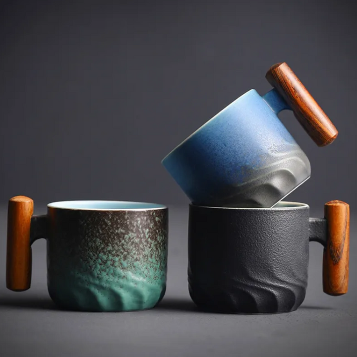 Artisan handmade ceramic mug with retro design & wooden handle. Ideal for espresso, coffee, or tea.