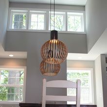Beautiful handcrafted natural wood pendant lamp, statement ceiling light for any room decor.
