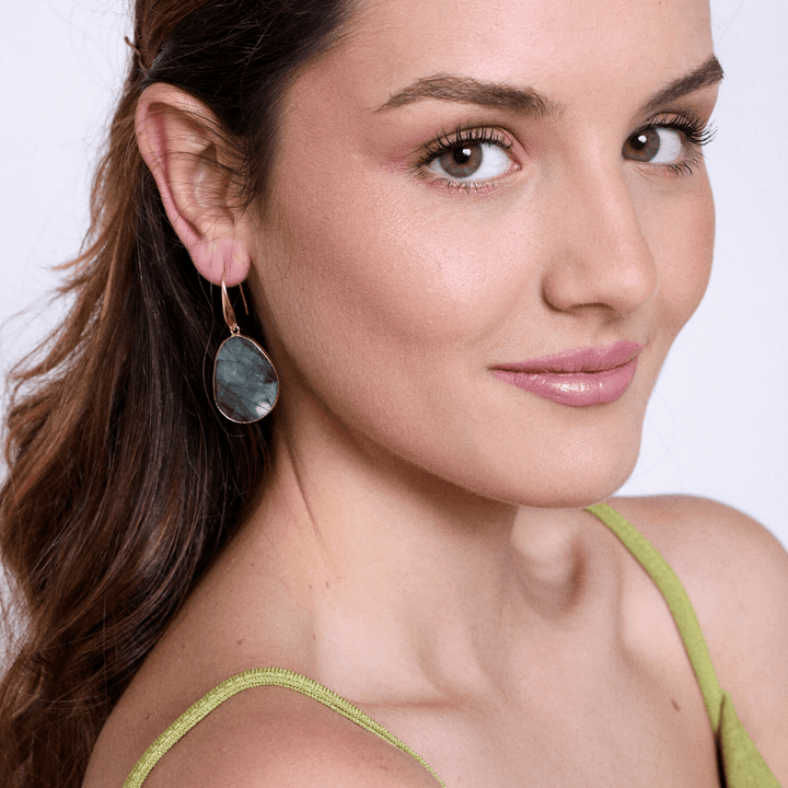 Elegant handcrafted labradorite drop earrings for women. Spiritual gemstone jewelry promoting intuition.