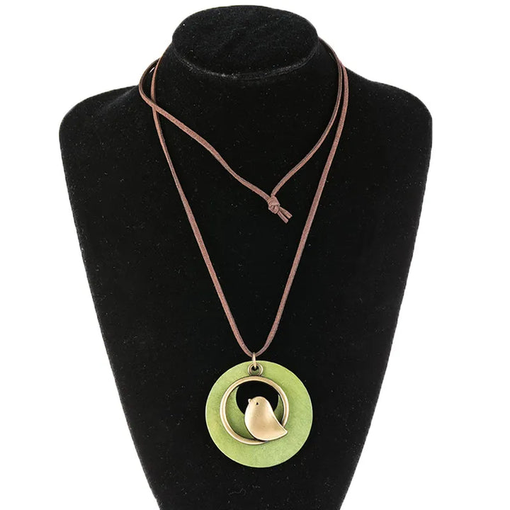 Ethnic handcrafted wooden bird necklace, unique design, natural wood, a stylish accessory for women.