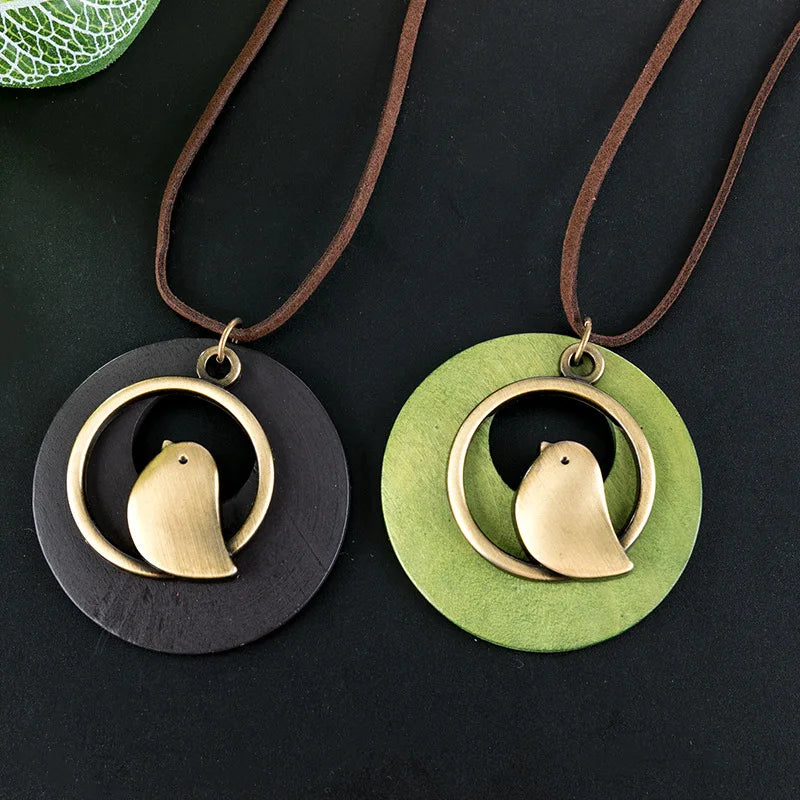 Women's unique wooden bird pendant, handcrafted ethnic necklace, a charming boho fashion accessory.