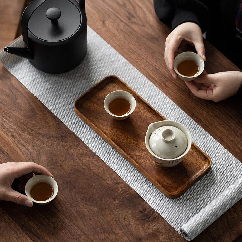 Versatile wooden serving tray for coffee, kitchen, or rustic tabletop decor.