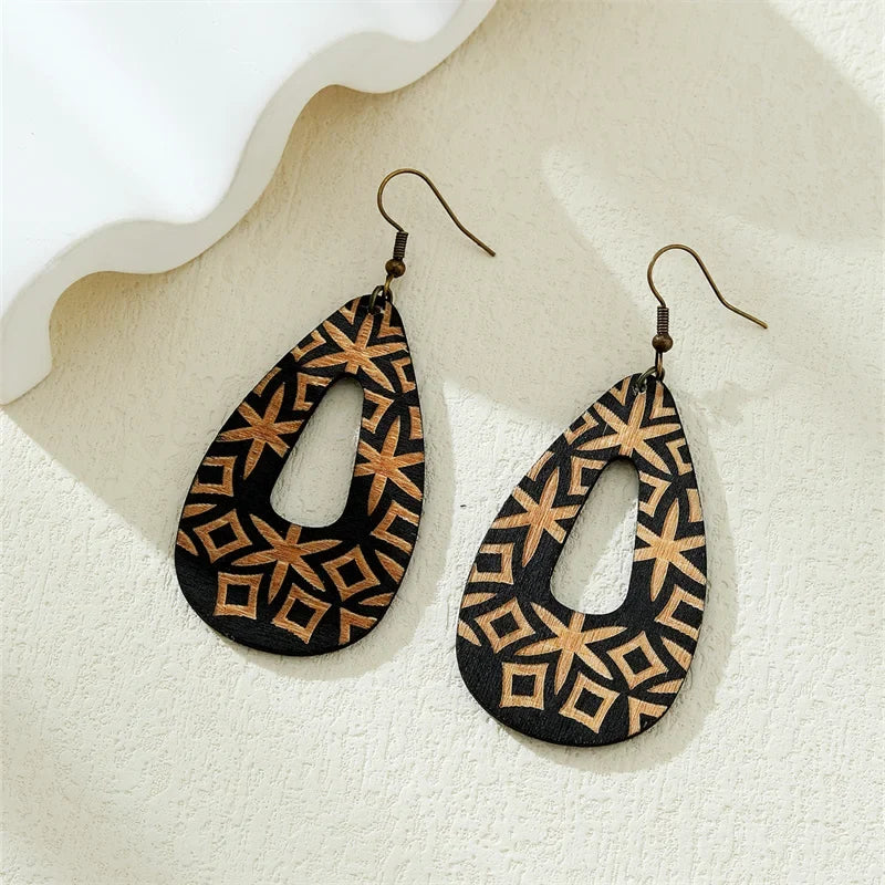Handmade bohemian wood earrings for women, lightweight boho style fashion accessory with natural wood finish.
