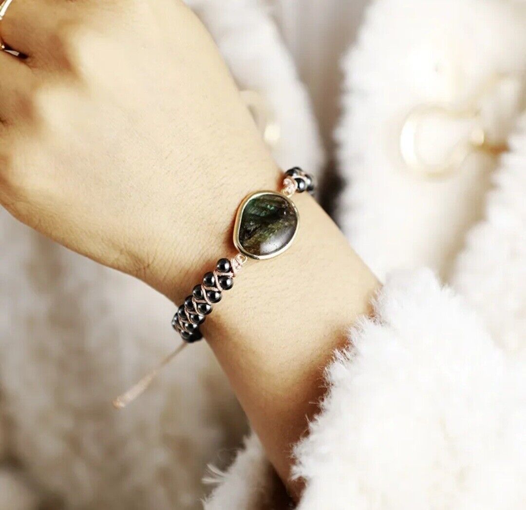 Women's elegant natural stone braided cuff bracelet, featuring deep onyx and hematite. Adjustable & spiritual.