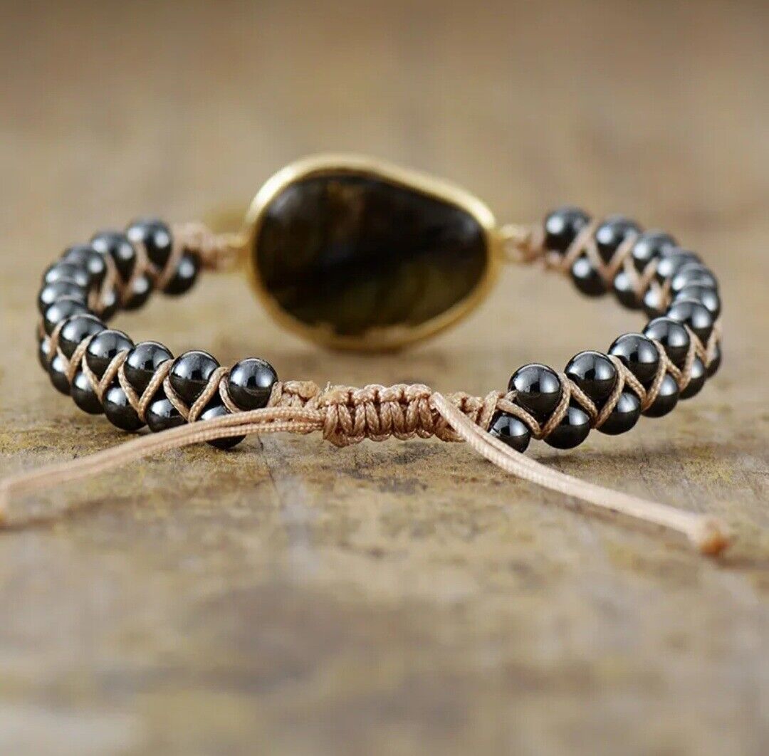 Adjustable natural stone braided cuff bracelet for mindful style, handmade with dark onyx & hematite beads.