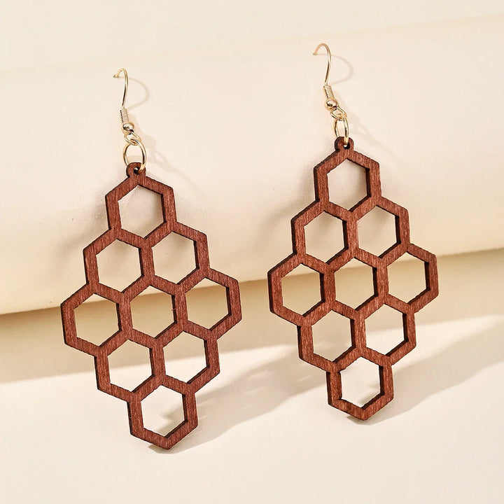 Fashionable retro carved wooden dangle earrings, artisan handmade jewelry for women's unique style.