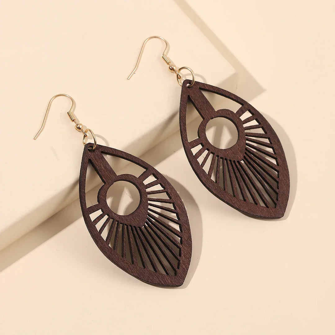 Elegant hand-carved natural wooden earrings with a retro design, unique dangle style for women.