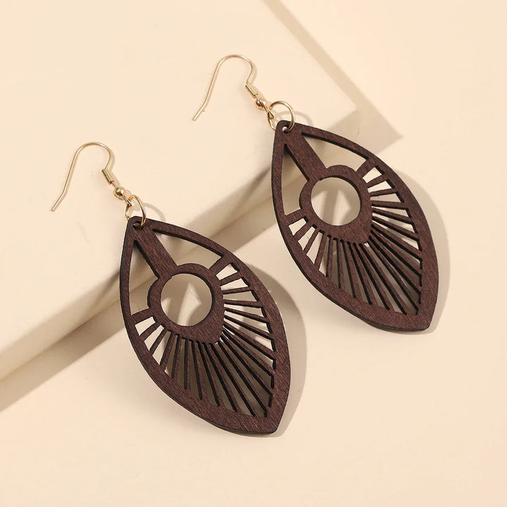 Elegant hand-carved natural wooden earrings with a retro design, unique dangle style for women.