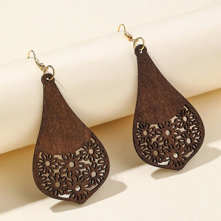 Distinctive retro carved wooden dangle earrings, handmade for women's unique vintage-inspired aesthetic.