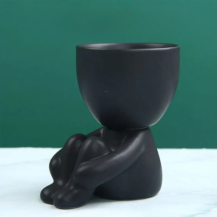 Small handmade terracotta ceramic pot, a rustic drainage planter for succulents on any desk.