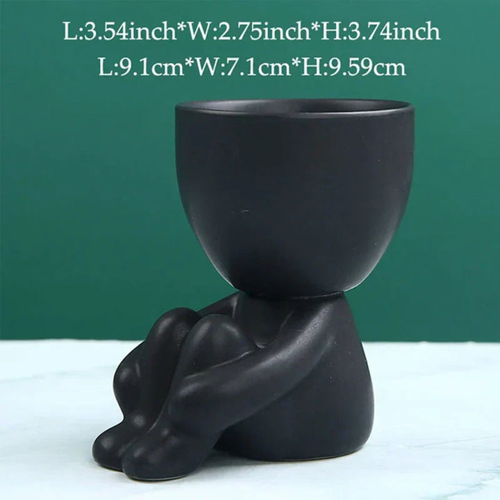 Terracotta ceramic succulent drainage pot, handmade for healthy plants in any indoor garden.