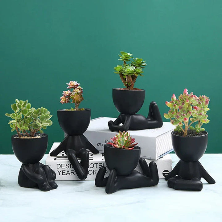 Indoor garden terracotta ceramic succulent pot, handmade with drainage for a rustic touch.