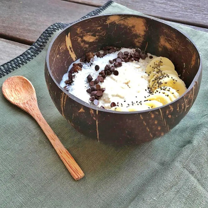 Sustainable handmade coconut shell bowl by TropiBowl. Unique, natural serving dish for an eco-conscious home & kitchen.