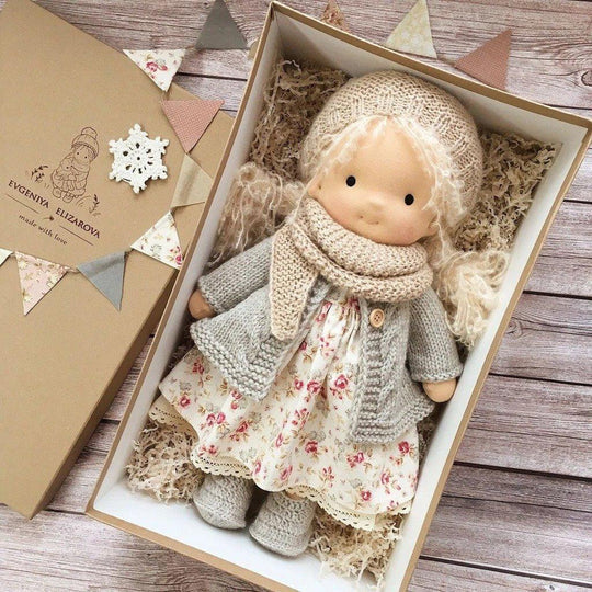 Children's handmade Waldorf doll, natural cotton fibers. Soft toy for imaginative play & comforting.