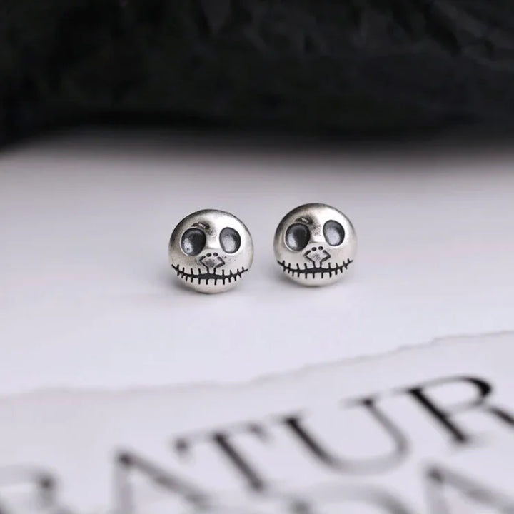 Unique women's Halloween statement earrings with handmade pumpkin & skull motifs, a spooky jewelry accessory.