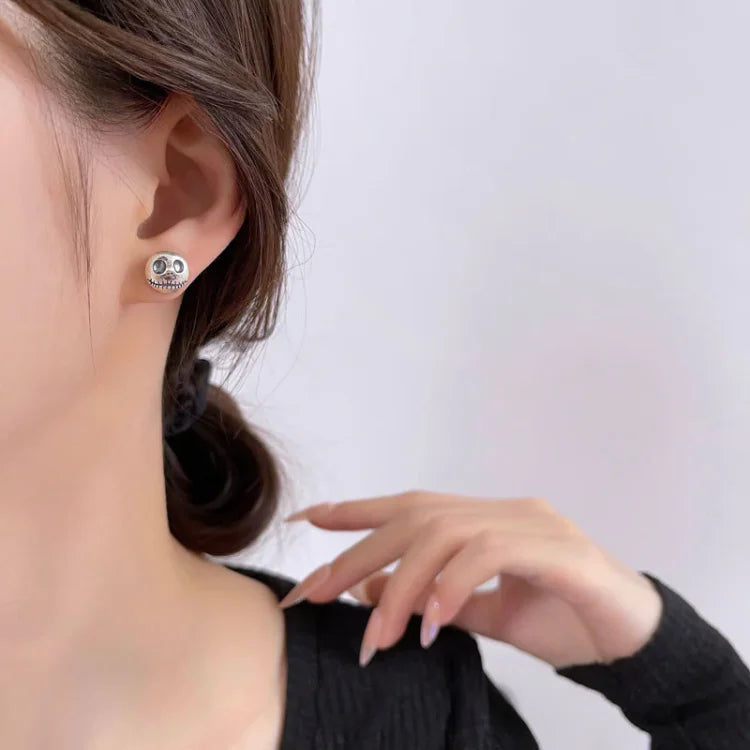 Spooky chic women's pumpkin skull earrings, handmade unique jewelry perfect for Halloween parties & themed outfits.